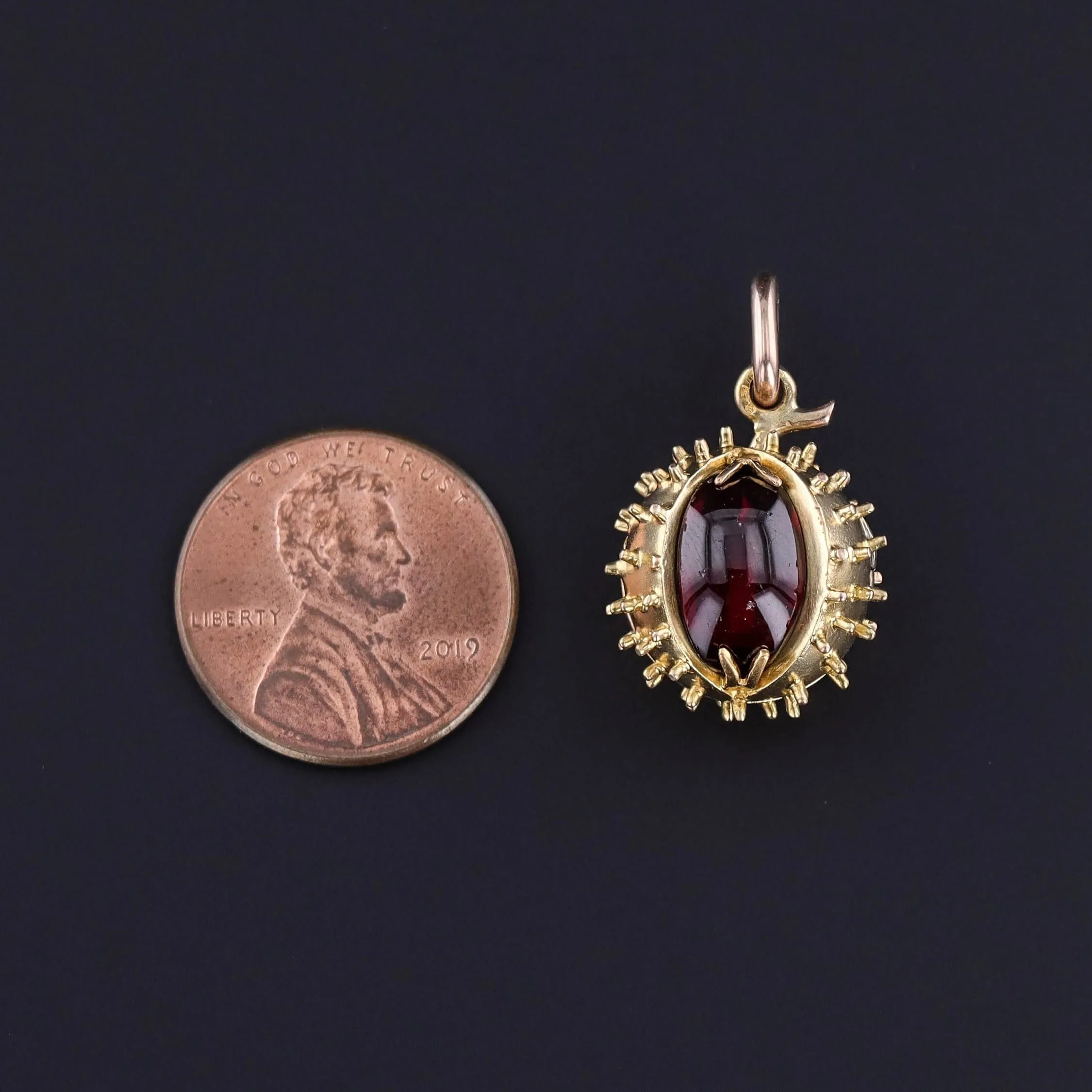 Antique Garnet Chestnut Locket of 14k Gold