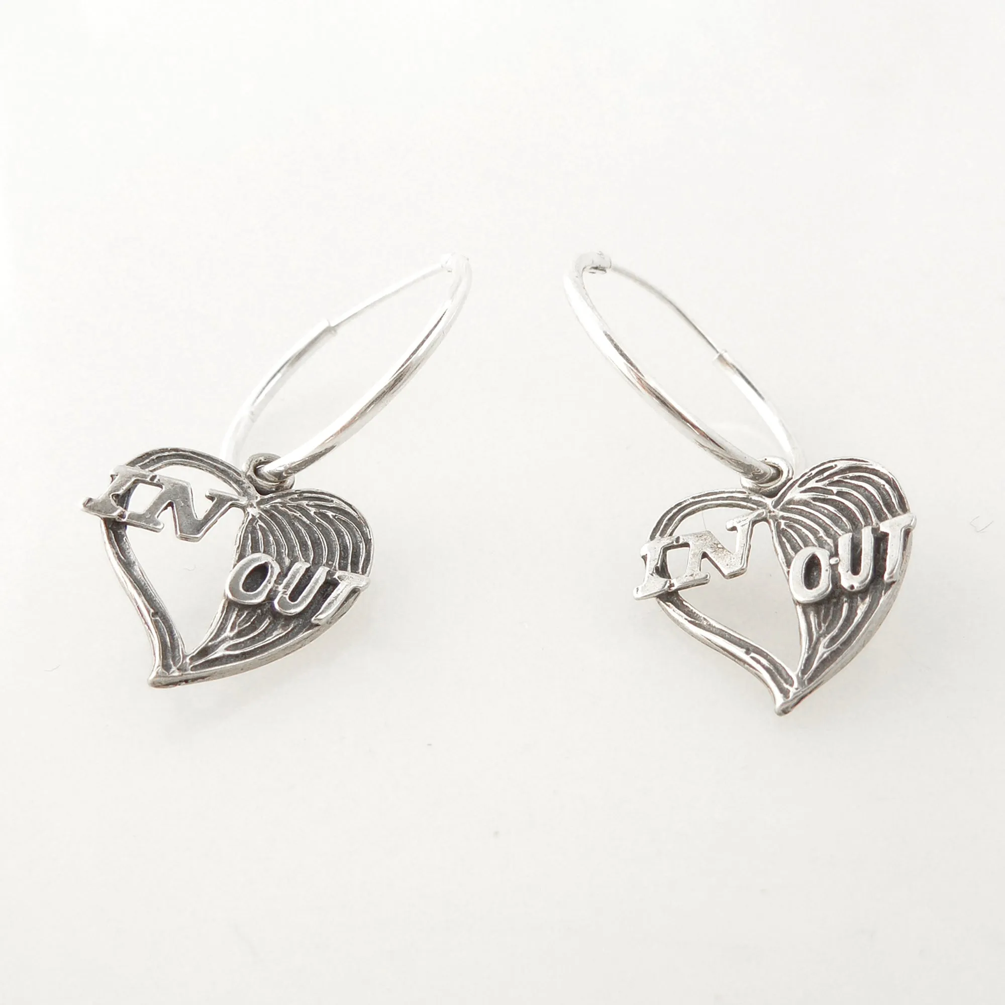 Define the relationship hoop earrings