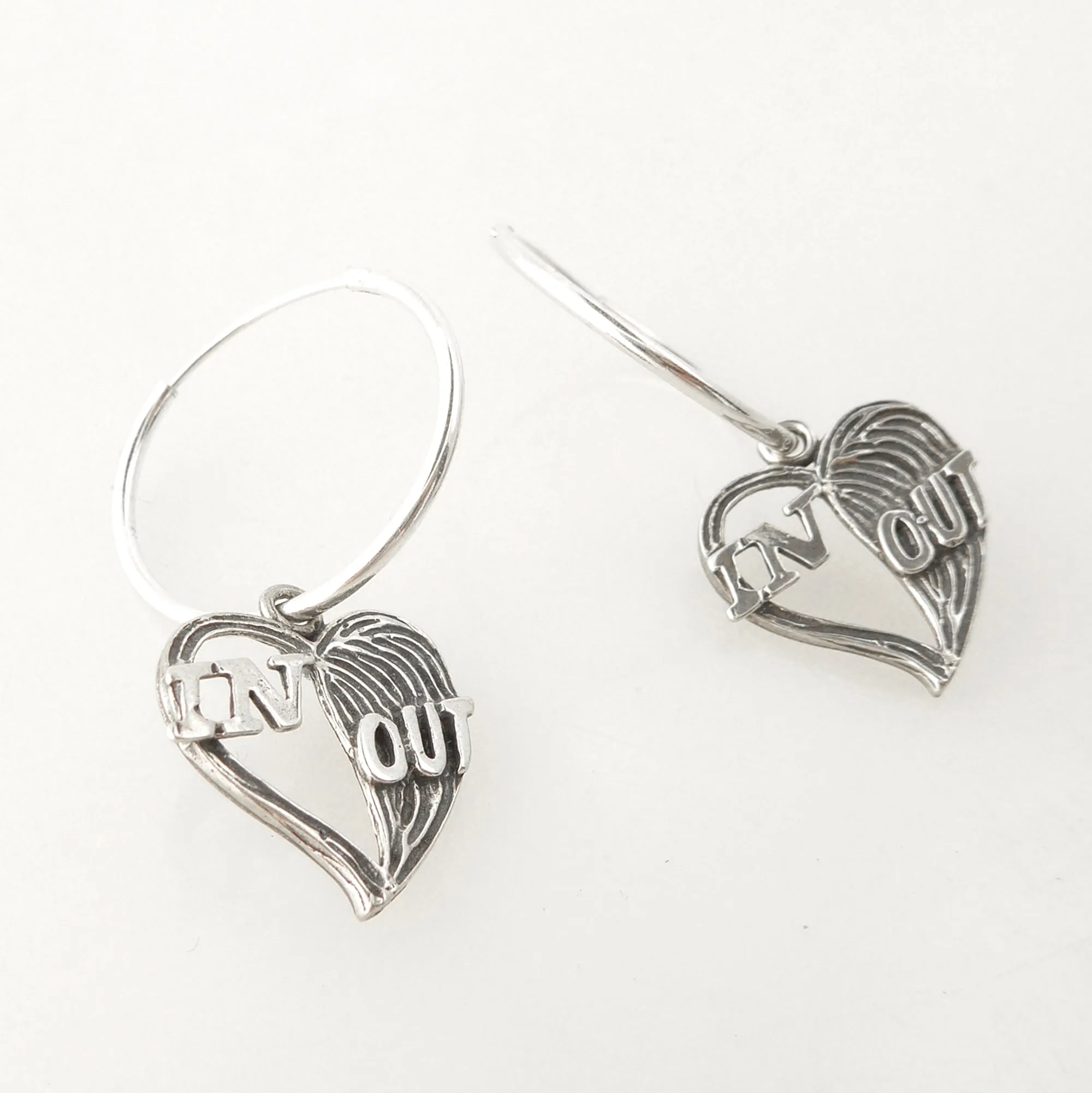 Define the relationship hoop earrings