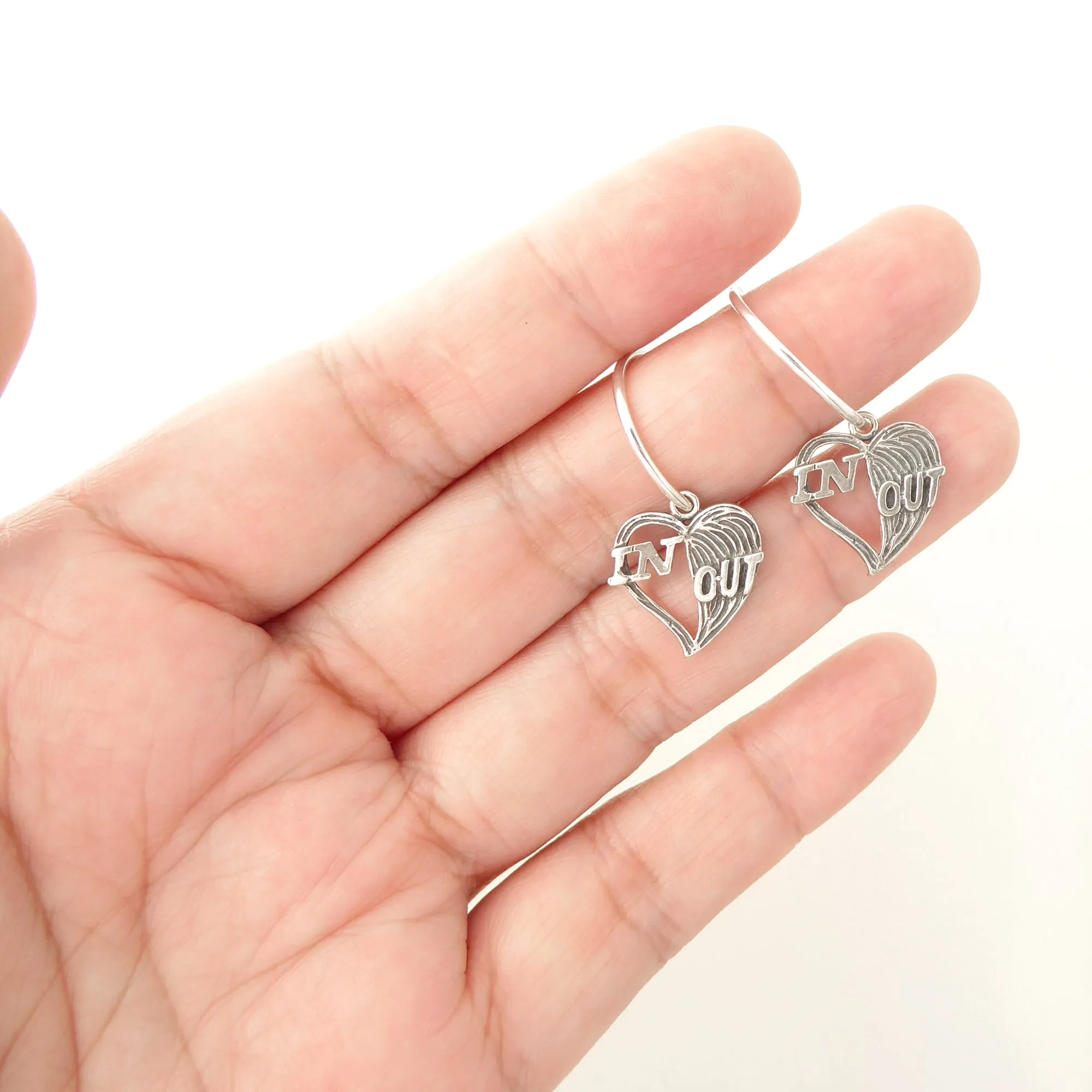 Define the relationship hoop earrings