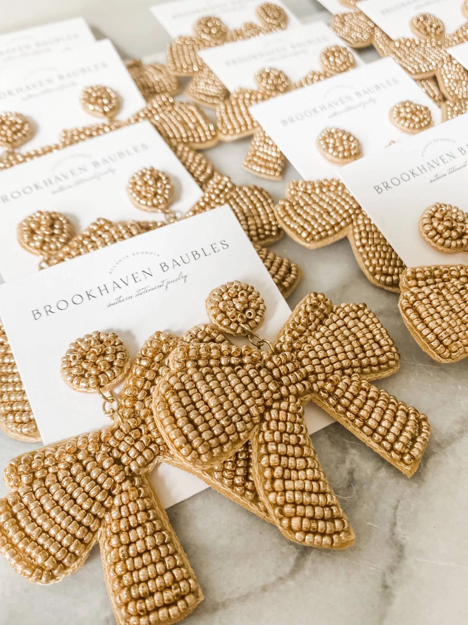 Gold Bow Beaded Statement Earrings