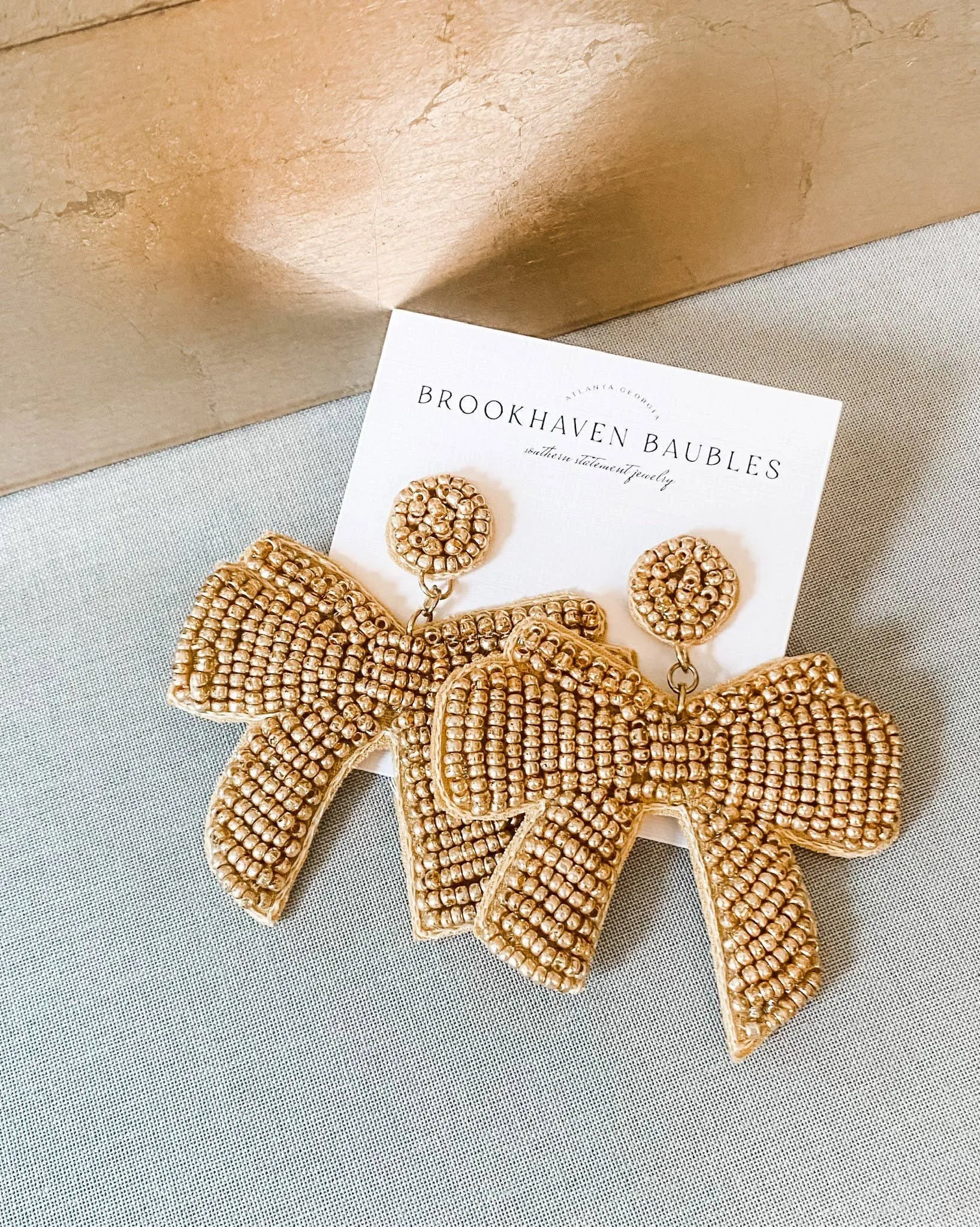 Gold Bow Beaded Statement Earrings