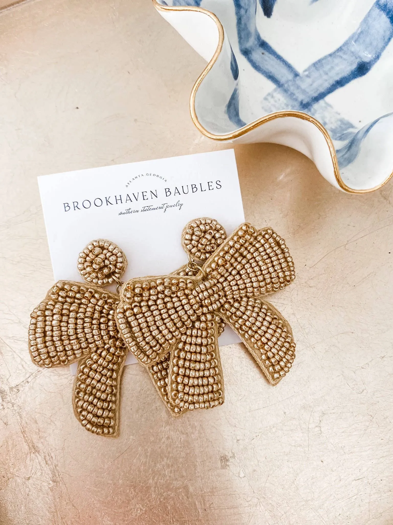 Gold Bow Beaded Statement Earrings