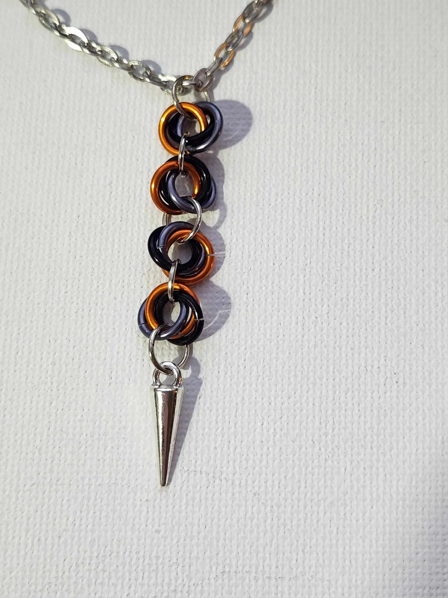 Spiked or Not Spiked Orange, Gray and Black Mobius Necklaces