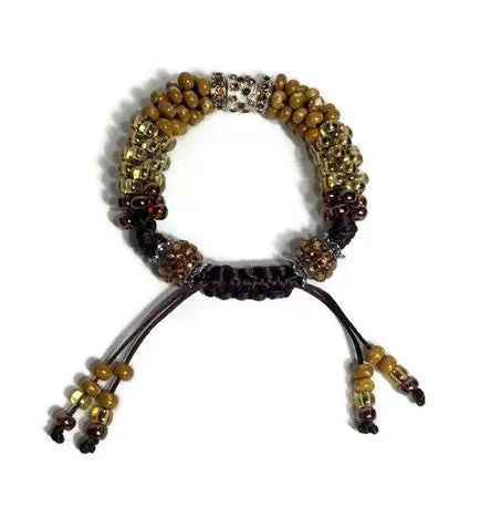 The Topaz beaded bracelet, woman size, topaz brown kumihimo wristlet, Boho-style, with macrame clasp