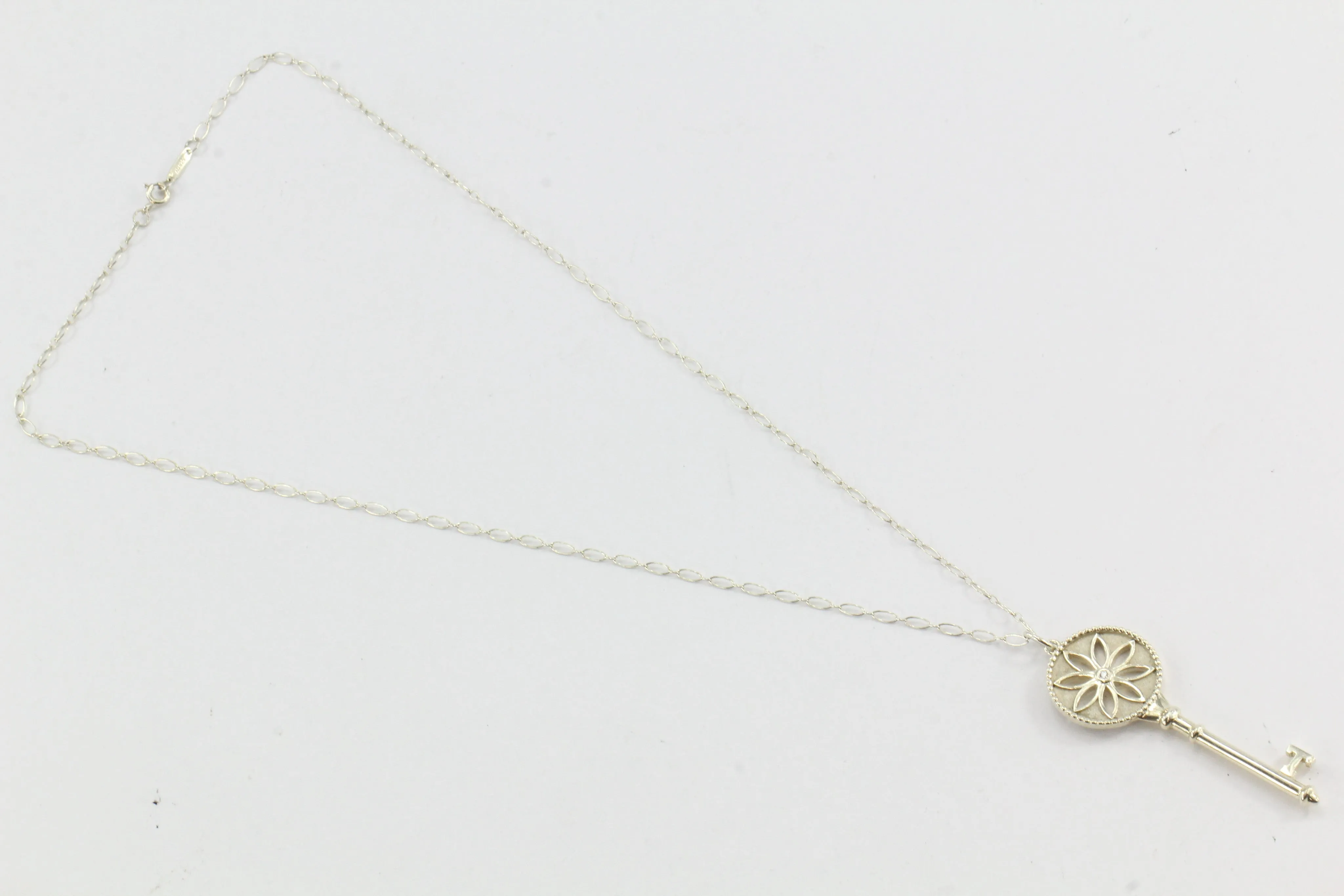 Tiffany & Co Sterling Silver Daisy Key Diamond Pendant & Chain