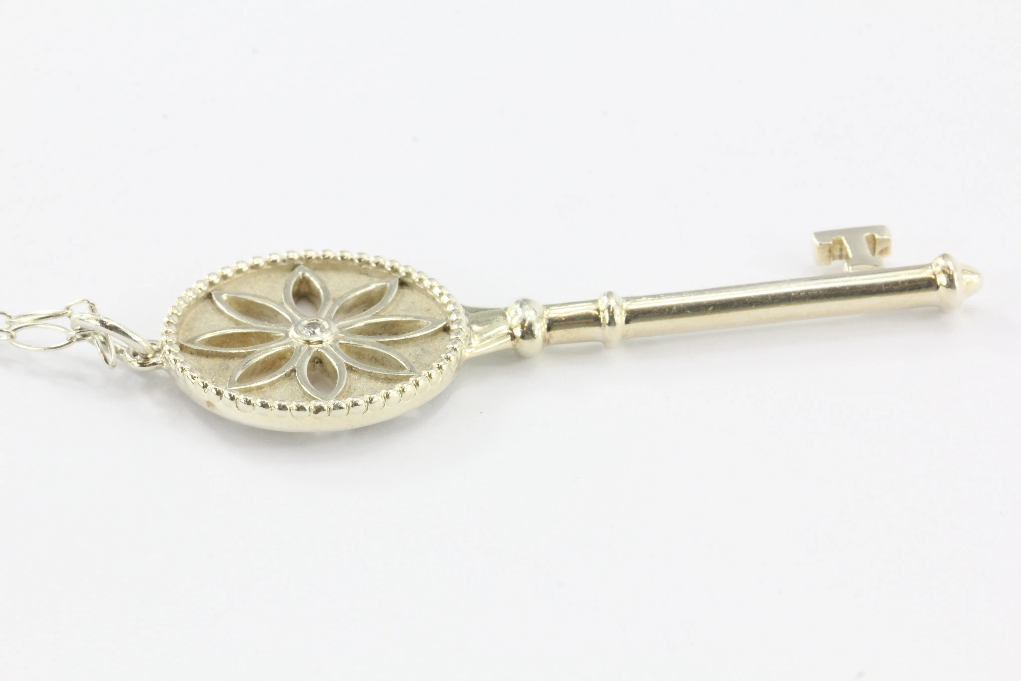 Tiffany & Co Sterling Silver Daisy Key Diamond Pendant & Chain